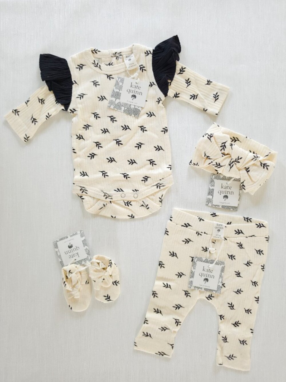 Kate Quinn Black and Oatmeal Leaf Ruffle Shoulder Bodysuit and Bow Set 0-3 Mo